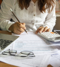 Accountant Working On Tax Return