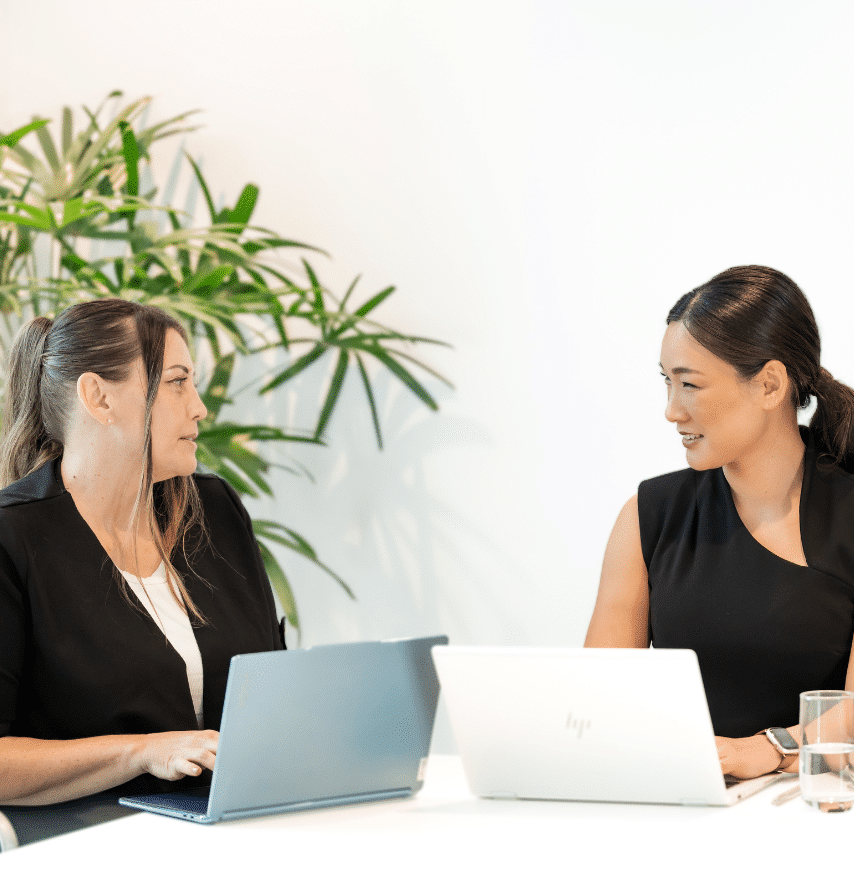 two business women having a meeting for general purpose financial statements